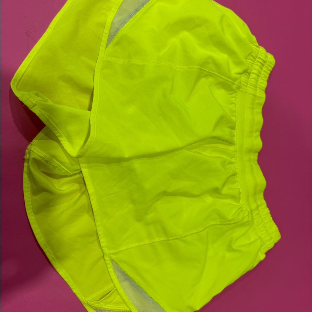 Neon Yellow lululemon hotty hot 4 inch low rise shorts size 4